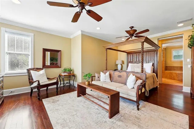 a view of a dining room with furniture and a window