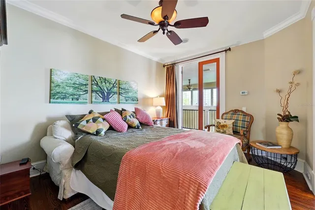 a bedroom with a bed and a chair