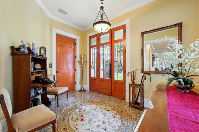 a living room with furniture or couch and a large window