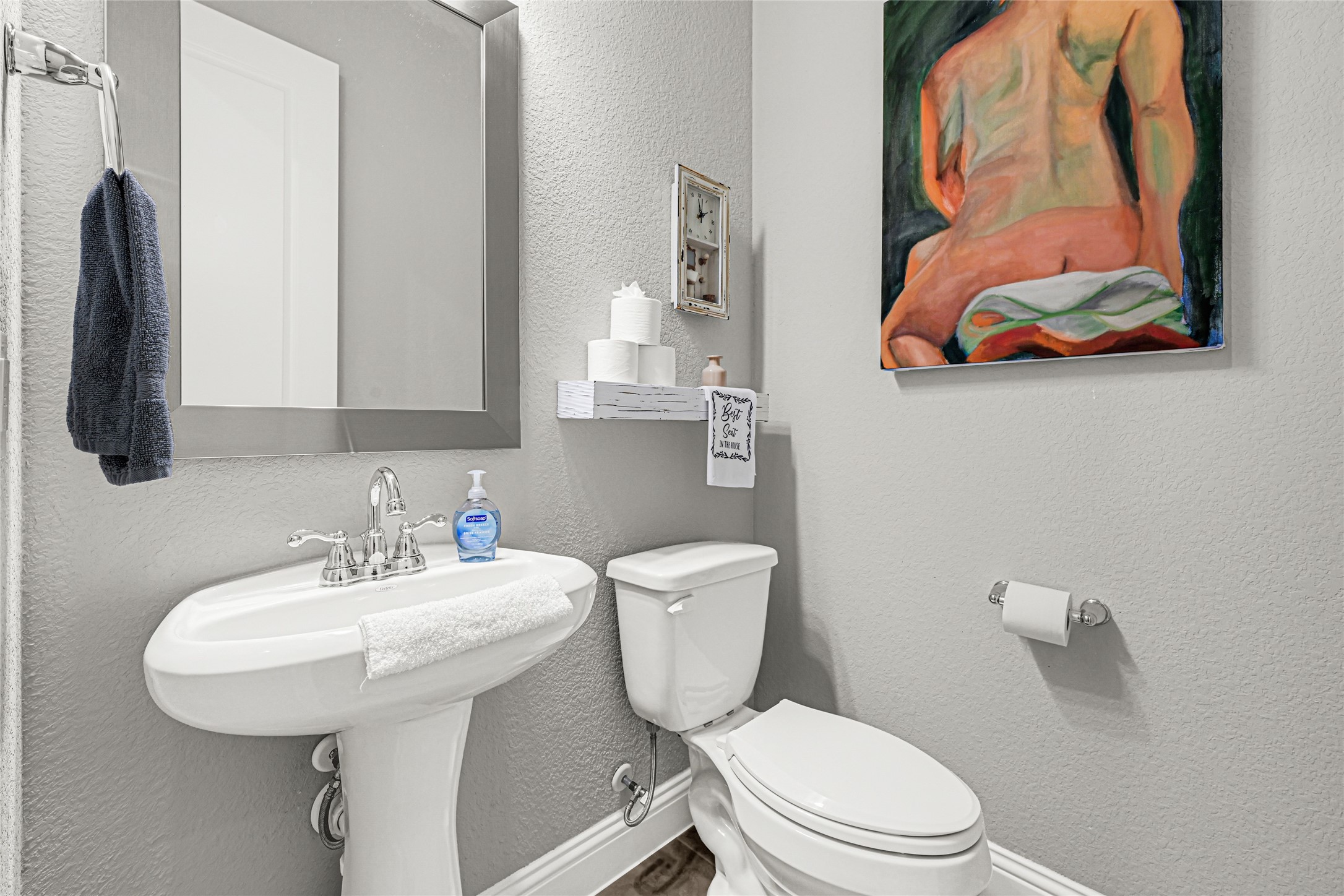 27533 Vivace Drive Spring, TX 77386 - Photo 21 of 26 a bathroom with a toilet a sink and mirror