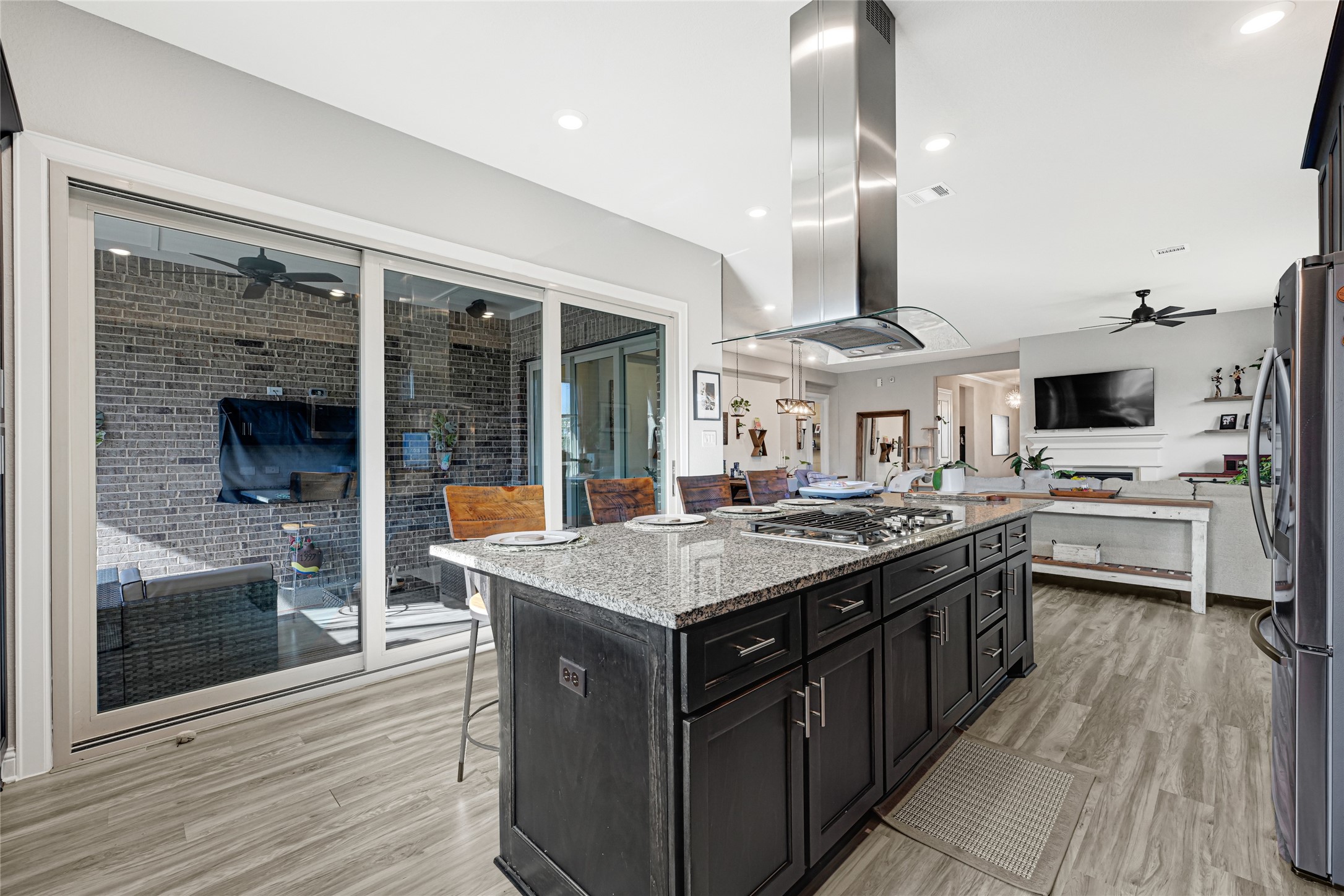 27533 Vivace Drive Spring, TX 77386 - Photo 6 of 26 a kitchen with stainless steel appliances a stove and a refrigerator