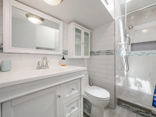 a view of a living room with a large window