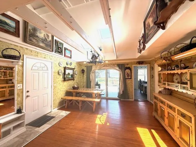 a bedroom with furniture and a book shelf