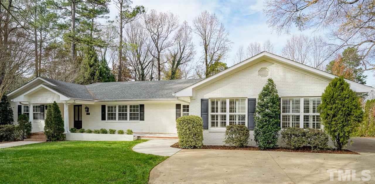 2606 Mayview Road Raleigh, NC 27607 - Photo 2 of 26 a front view of a house with a yard and porch