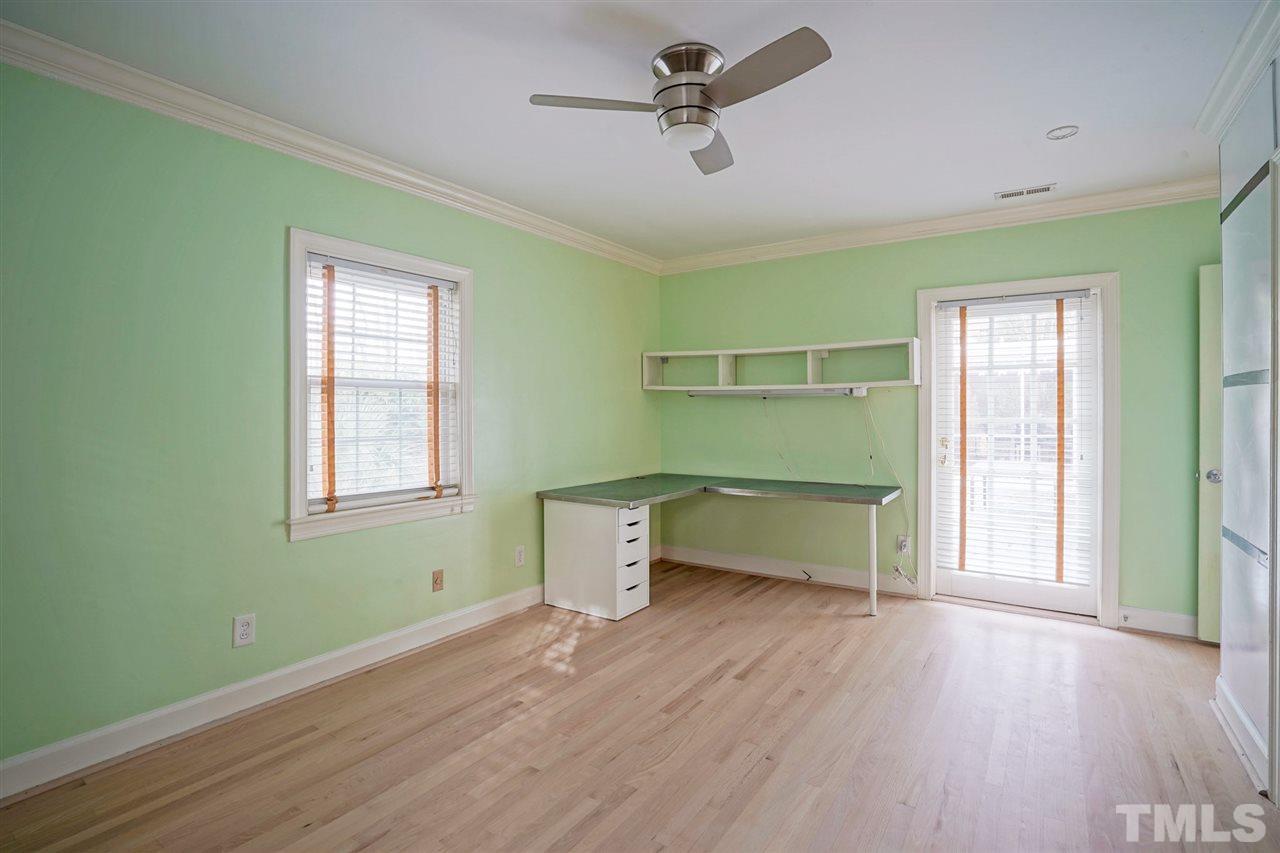 2606 Mayview Road Raleigh, NC 27607 - Photo 16 of 26 a view of room with window and wooden floor