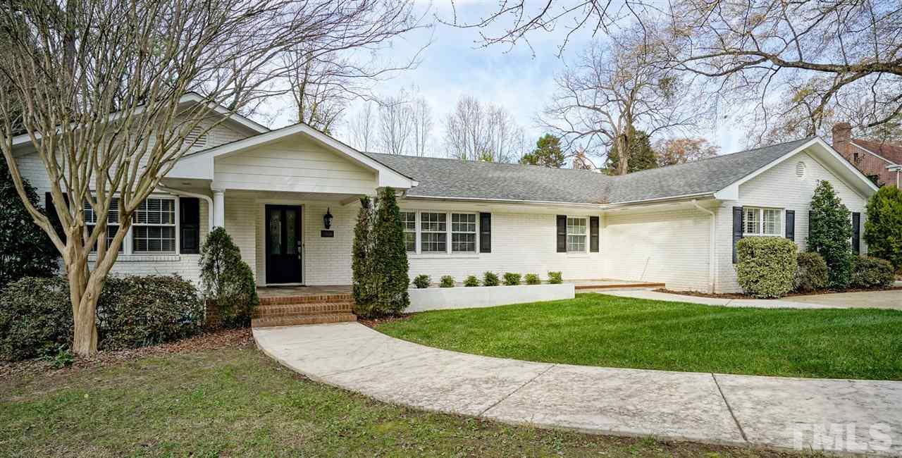 2606 Mayview Road Raleigh, NC 27607 - Photo 3 of 26 a front view of a house with a yard and porch