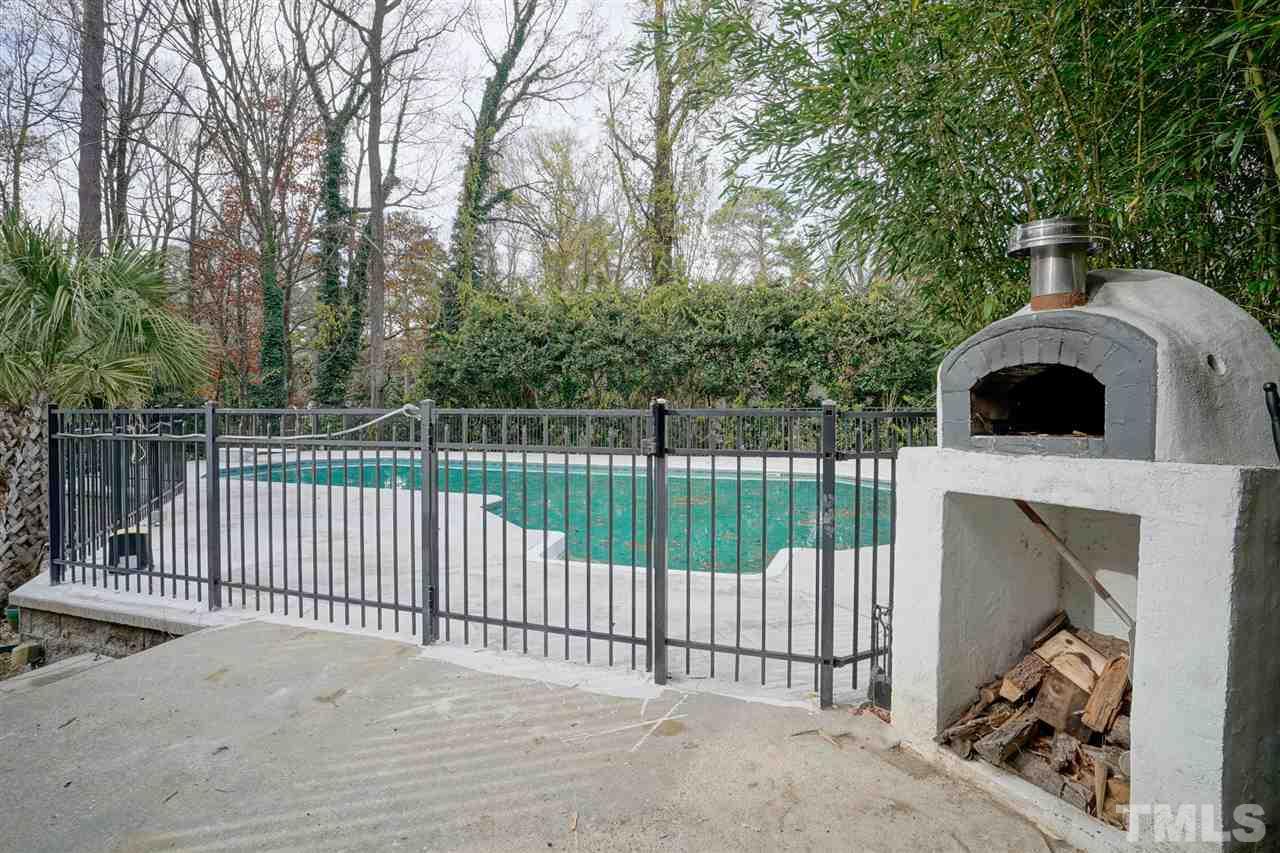 2606 Mayview Road Raleigh, NC 27607 - Photo 25 of 26 a view of a wrought iron fences in front of house