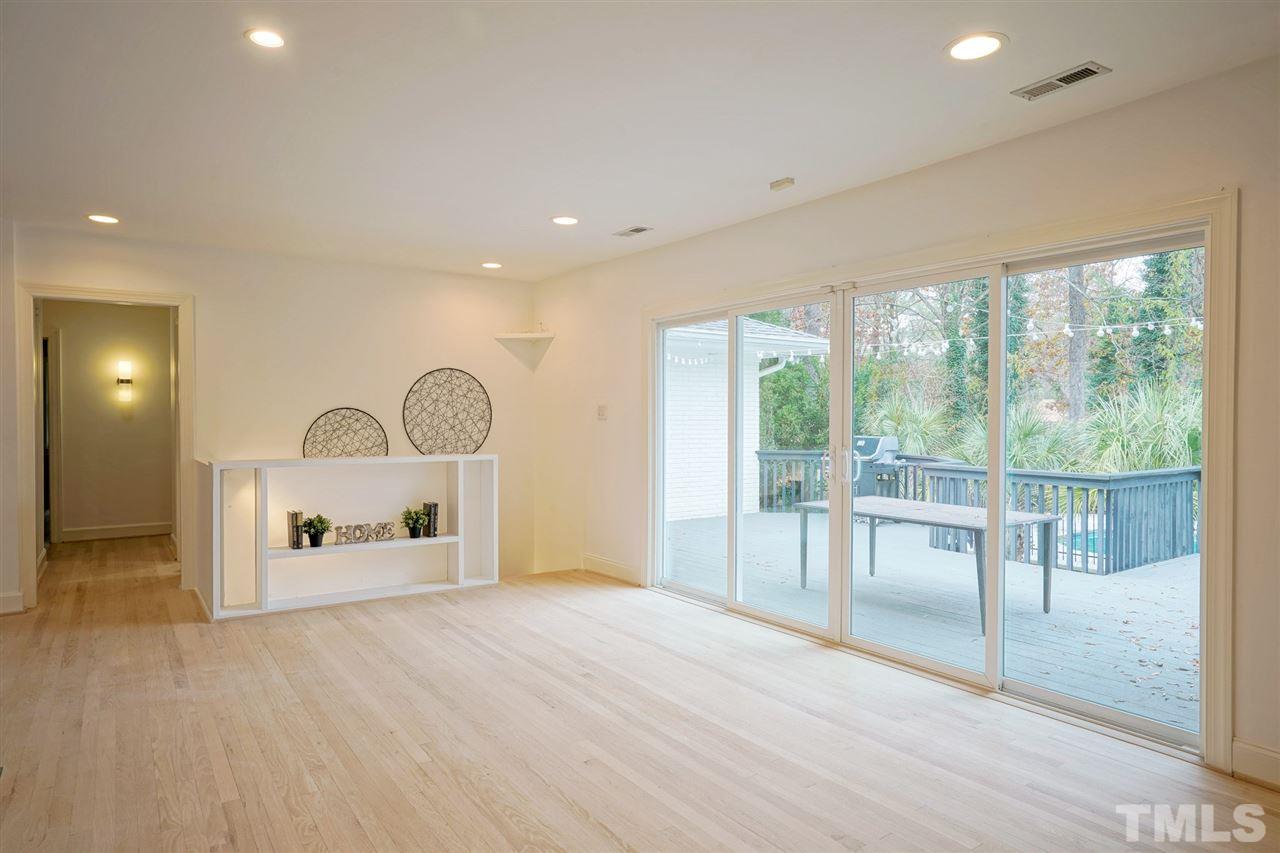 2606 Mayview Road Raleigh, NC 27607 - Photo 6 of 26 a view of a livingroom with furniture window and wooden floor