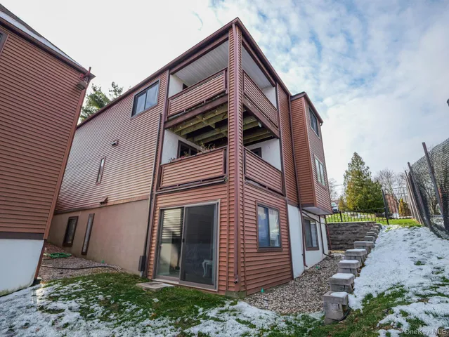 a view of a house with a deck