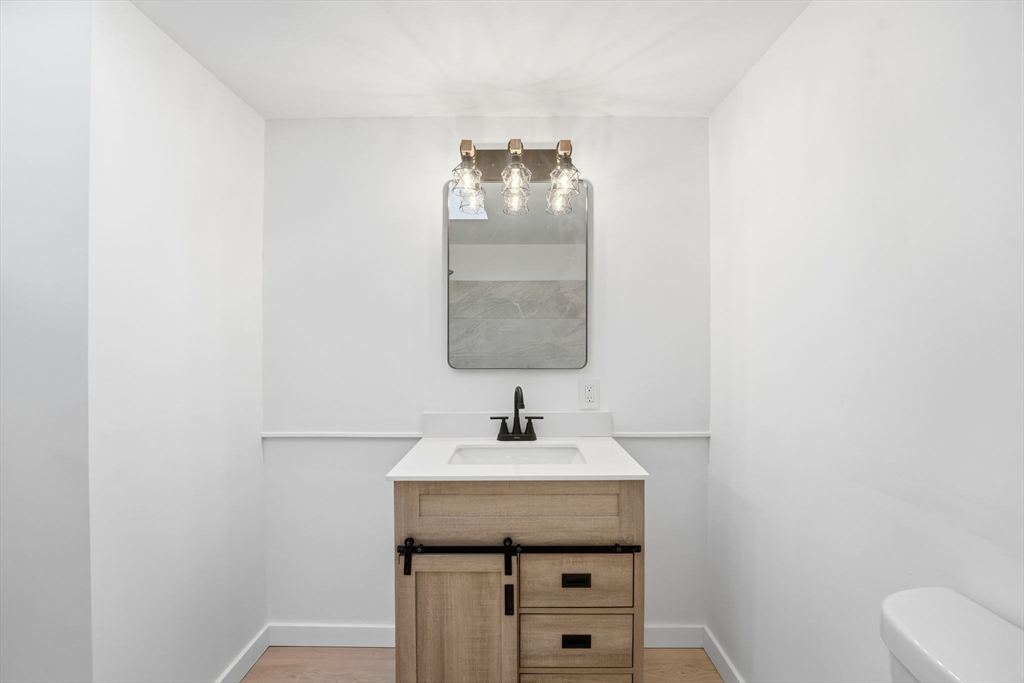 95 Samson Avenue Somerset, MA 02726 - Photo 18 of 36 a bathroom with a sink and a mirror