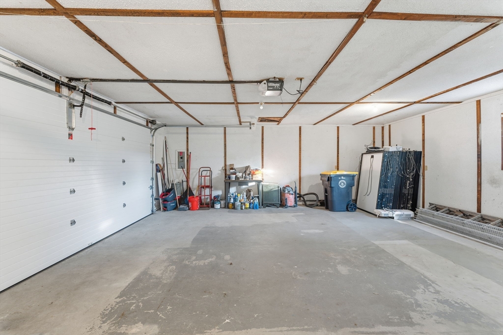 95 Samson Avenue Somerset, MA 02726 - Photo 32 of 36 a view of a garage with red white house