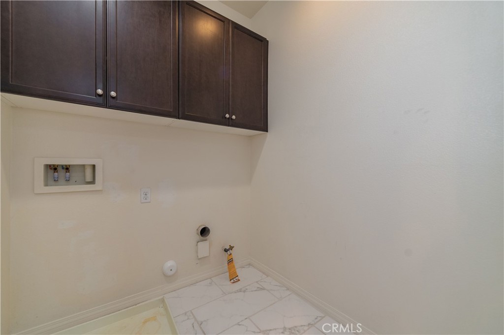 6014 Eucalyptus Avenue Chino, CA 91710 - Photo 8 of 16 a view of storage and utility room with cabinets