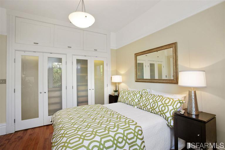 3754 Cesar Chavez San Francisco, CA 94110 - Photo 11 of 22 Master bedroom with built-in closets from floor to ceiling.