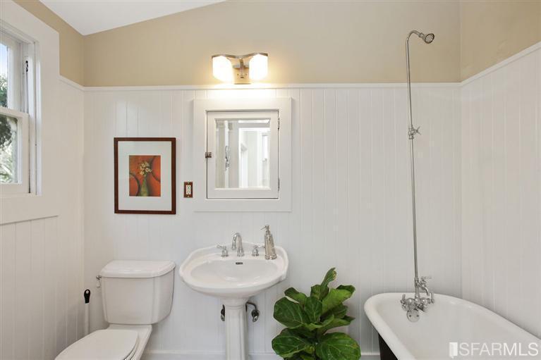 3754 Cesar Chavez San Francisco, CA 94110 - Photo 13 of 22 Bathroom with pedestal sink and claw foot tub.
