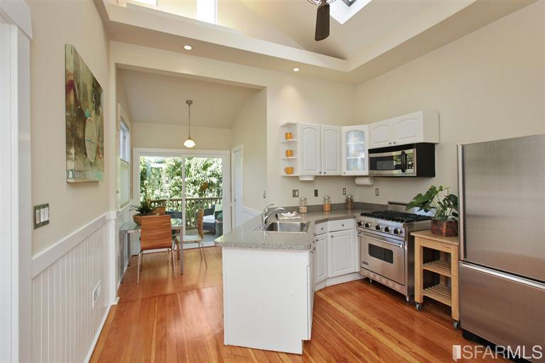 3754 Cesar Chavez San Francisco, CA 94110 - Photo 6 of 22 Updated bright and open kitchen- Amana refrigerator, Viking gas stove and microwave.