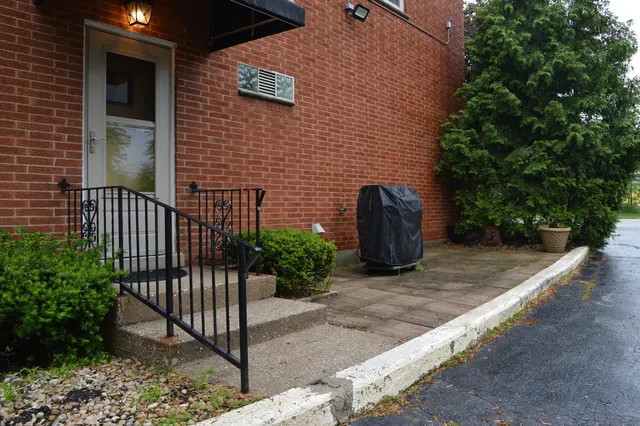 a view of a brick wall of the building