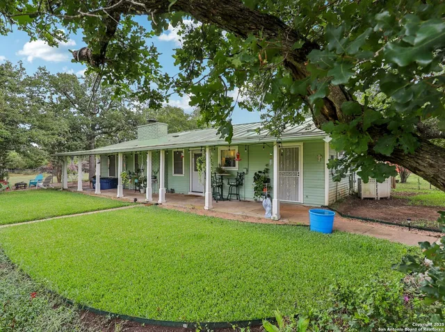 front view of a house with a garden