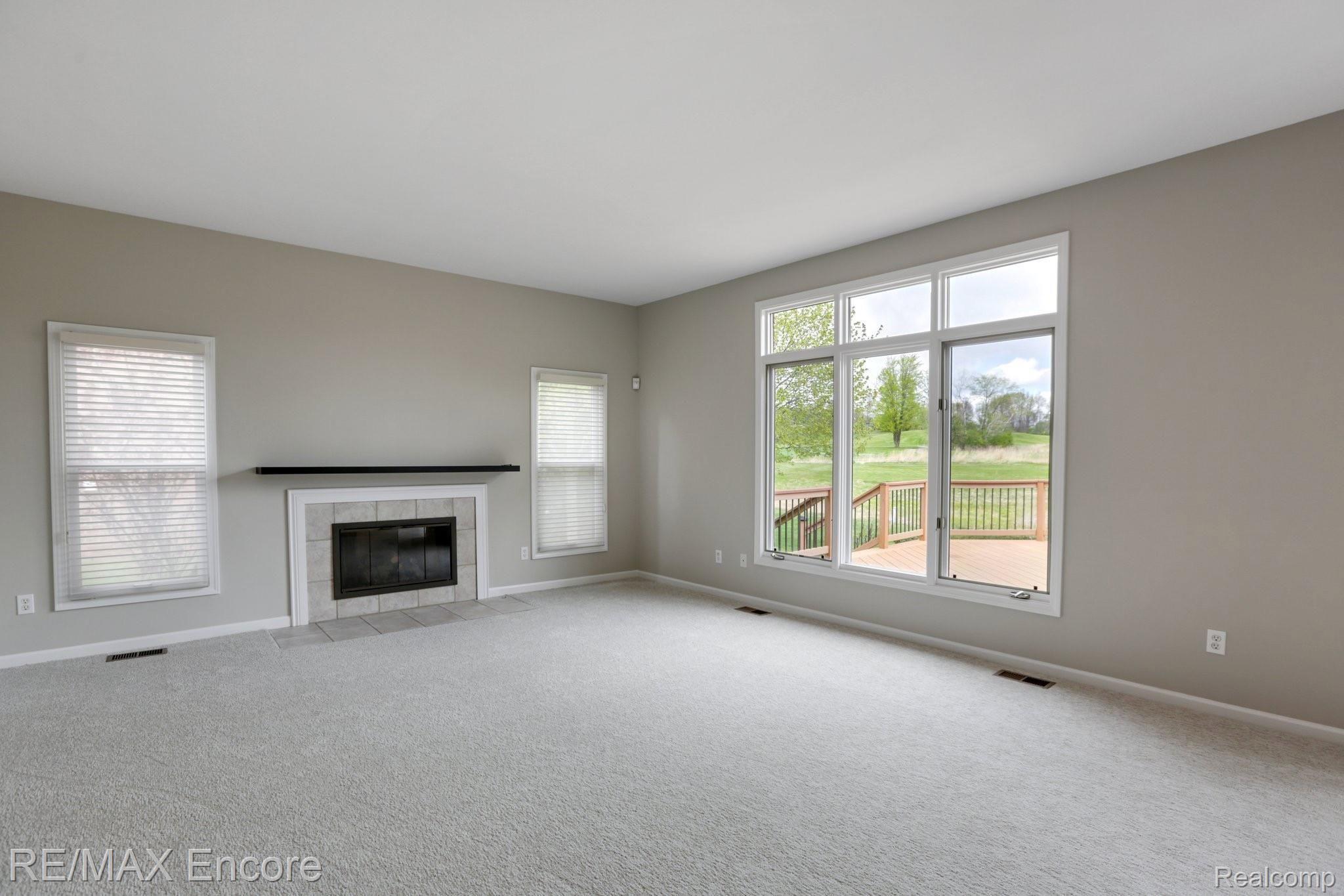 6791 Oakhurst Ridge Road Clarkston, MI 48348 - Photo 13 of 37 Family Room with Gas Fireplace