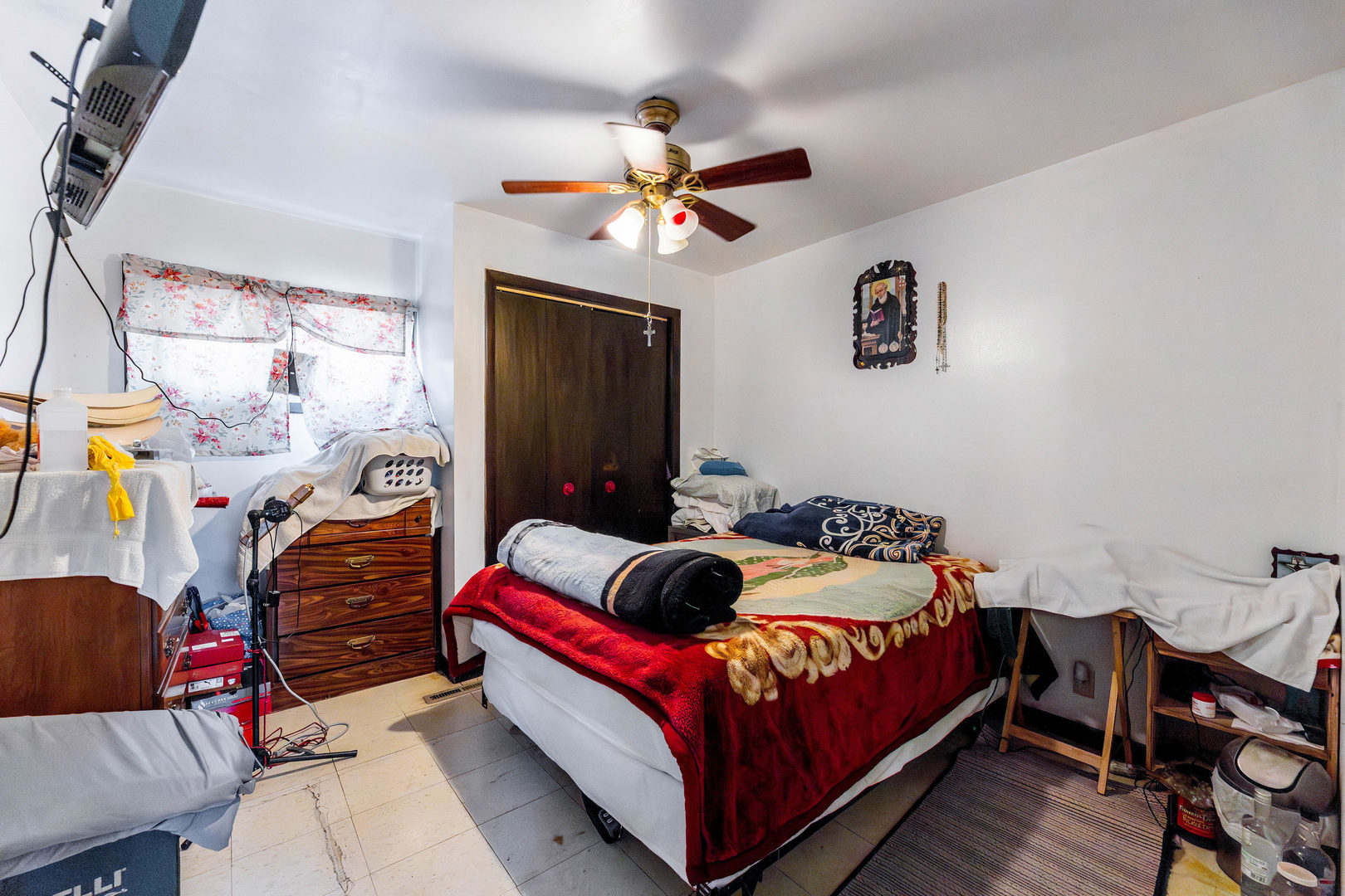 6105 South Archer Road Summit, IL 60501 - Photo 15 of 25 a bedroom with a bed and wooden floor