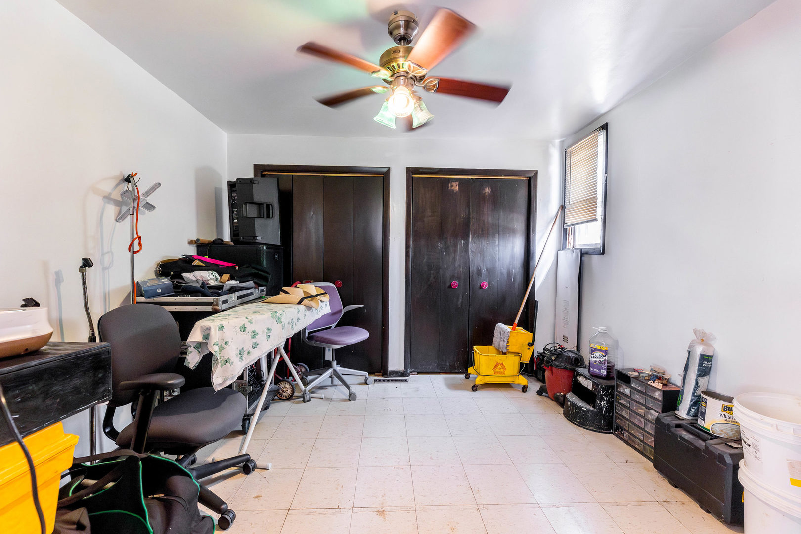 6105 South Archer Road Summit, IL 60501 - Photo 8 of 25 a living room with furniture and a chandelier