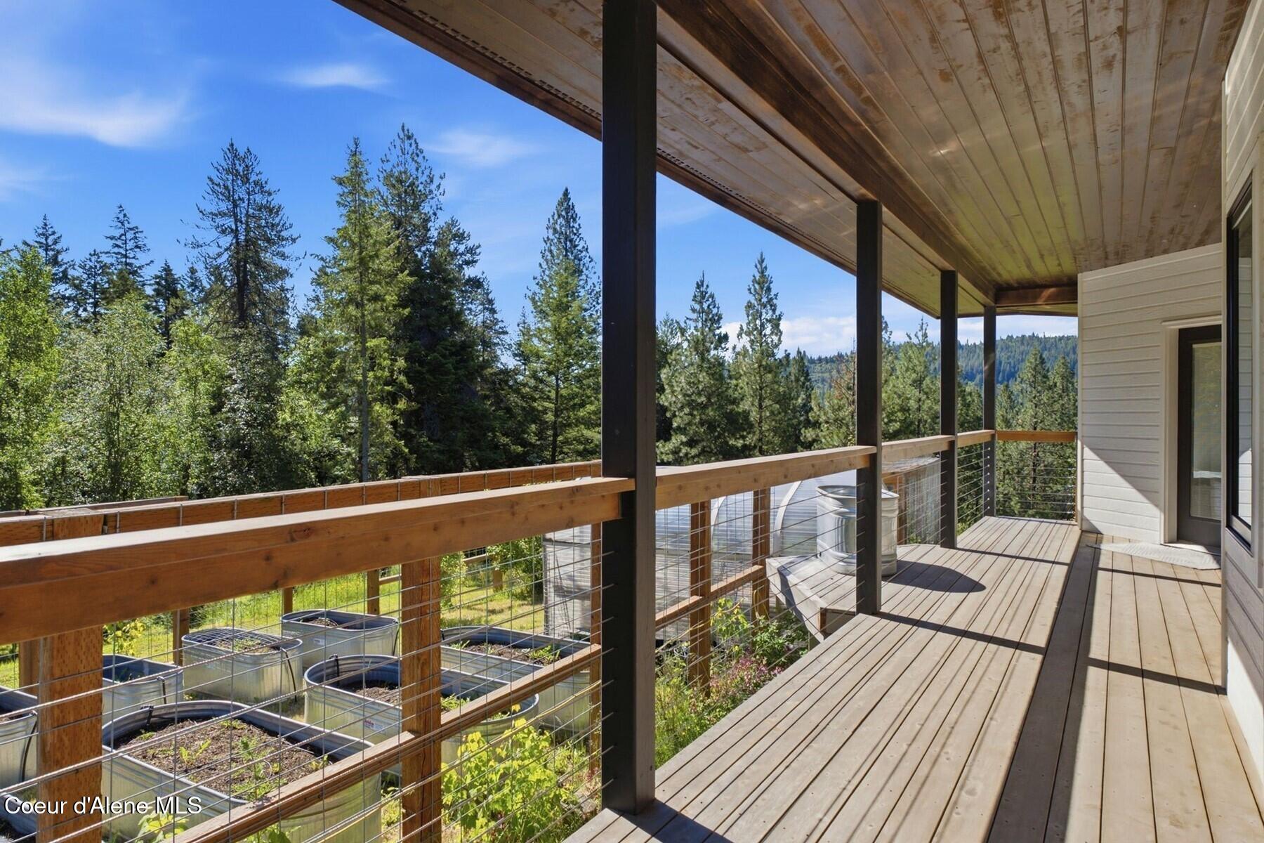 10988 West Thompson Road Coeur D'Alene, ID 83814 - Photo 52 of 71 Covered Wrap Around Porch!