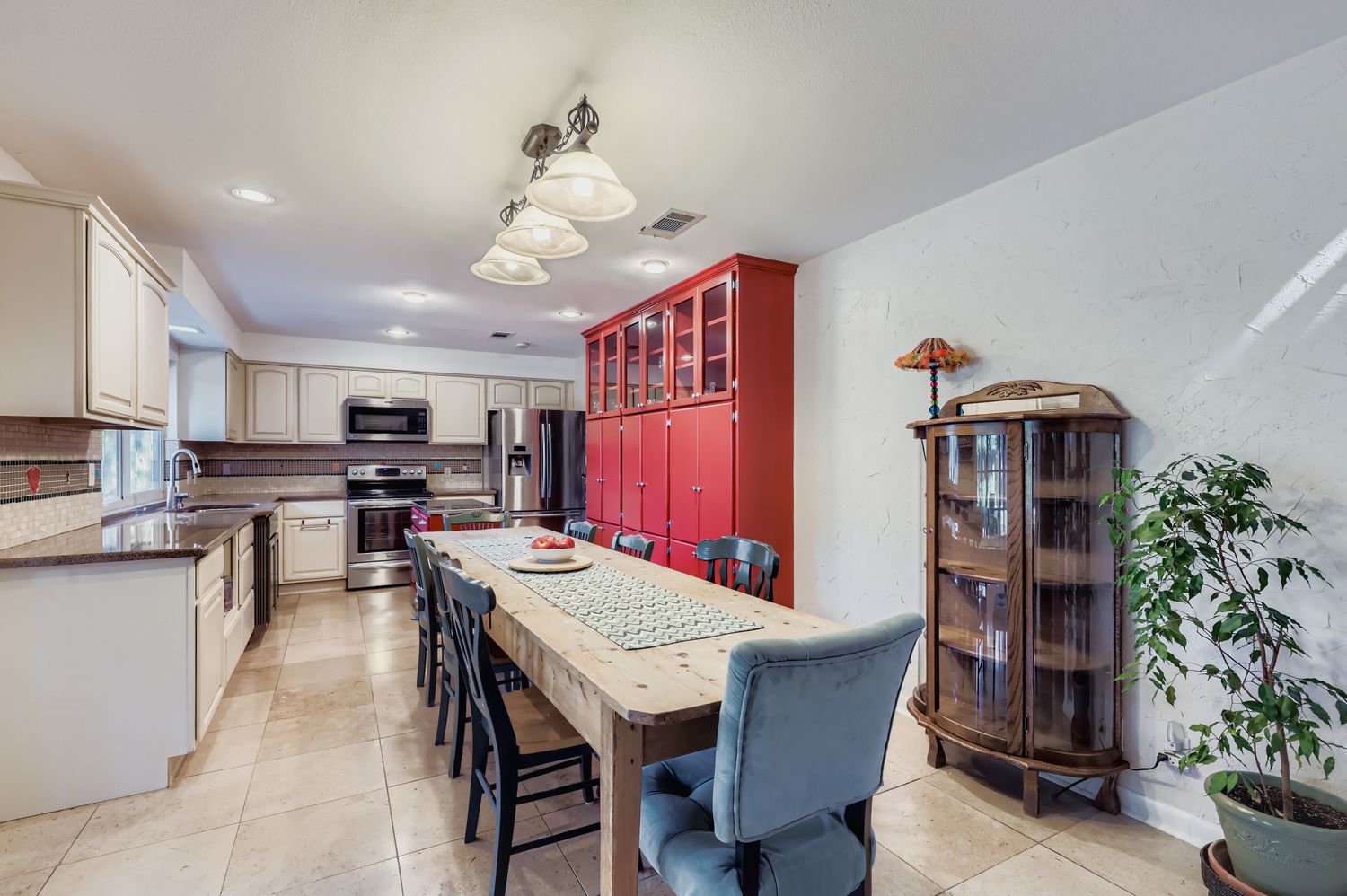 11718 Running Fox Trail Austin, TX 78759 - Photo 13 of 30 a dining room with furniture and wooden floor
