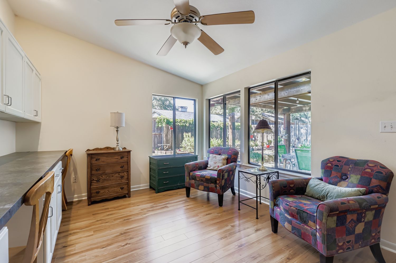 11718 Running Fox Trail Austin, TX 78759 - Photo 5 of 30 Addition Sun room that can be used as an office, extra living space, formal dining or sitting area.