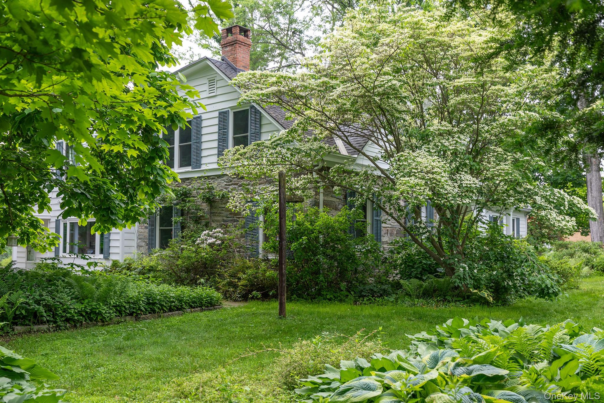 202 Buckwheat Road Hudson, NY 12534 - Photo 30 of 49 a view of a house with a backyard