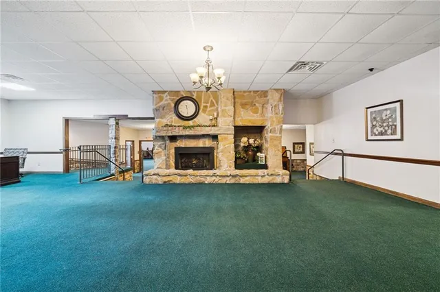 a view of a livingroom with furniture and window