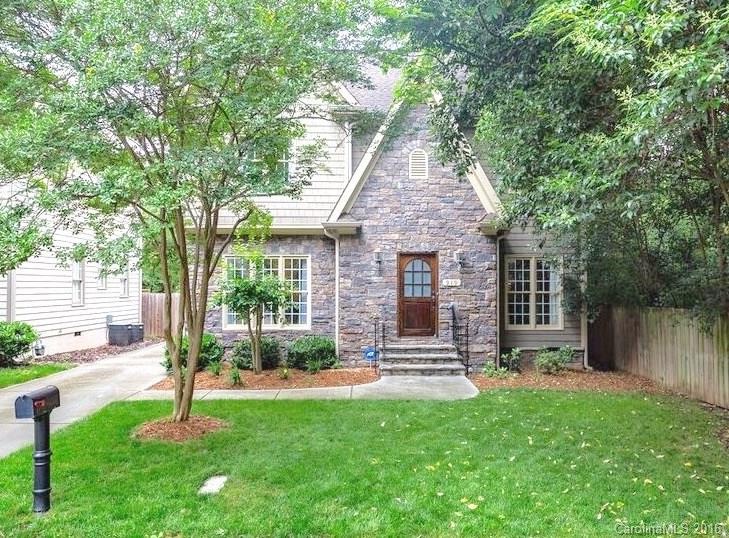919 Millbrook Road Charlotte, NC 28211 - Photo 1 of 20 a front view of a house with garden