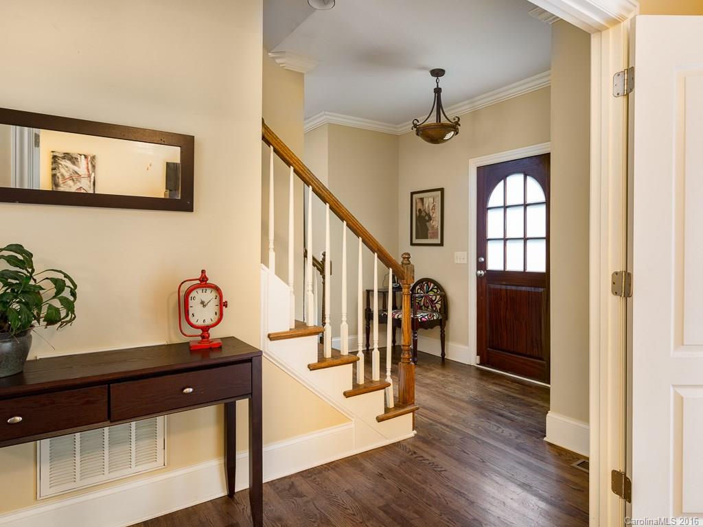 919 Millbrook Road Charlotte, NC 28211 - Photo 2 of 20 a view of entryway and hall with wooden floor