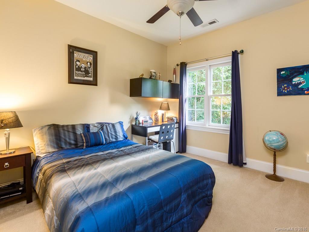 919 Millbrook Road Charlotte, NC 28211 - Photo 13 of 20 a bedroom with bed and a window