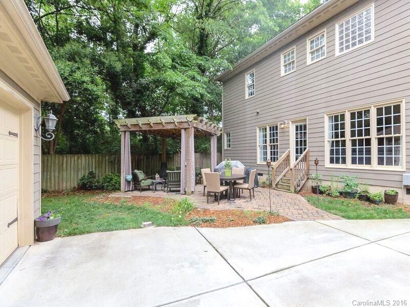 919 Millbrook Road Charlotte, NC 28211 - Photo 16 of 20 a view of a house with backyard and porch