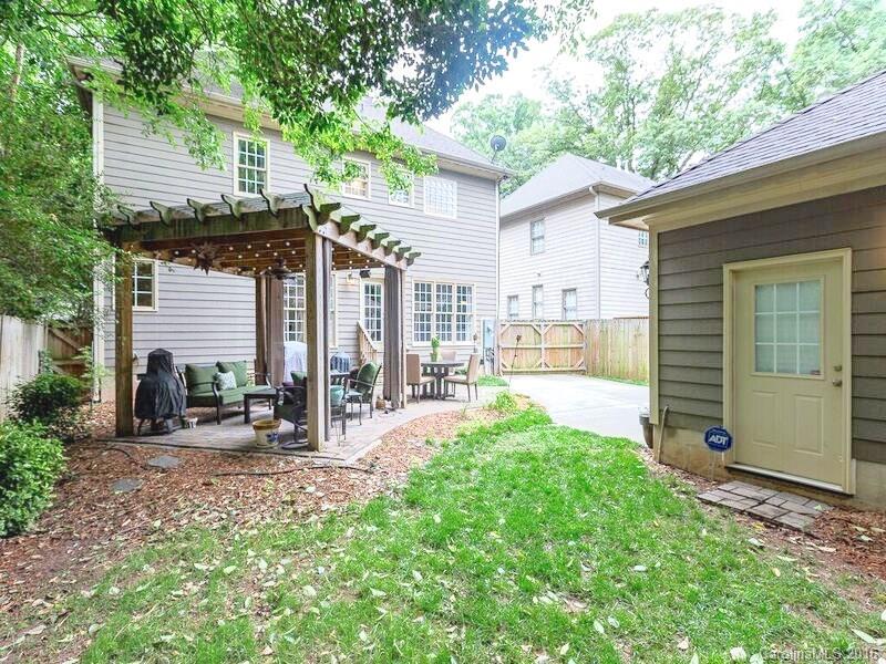 919 Millbrook Road Charlotte, NC 28211 - Photo 17 of 20 a front view of house with yard and seating area
