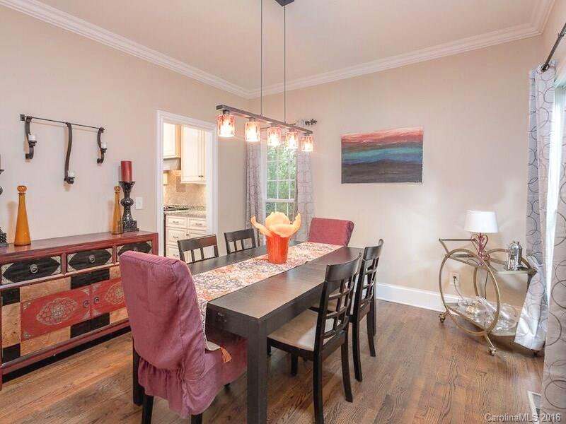 919 Millbrook Road Charlotte, NC 28211 - Photo 18 of 20 a view of a dining room with furniture window and wooden floor