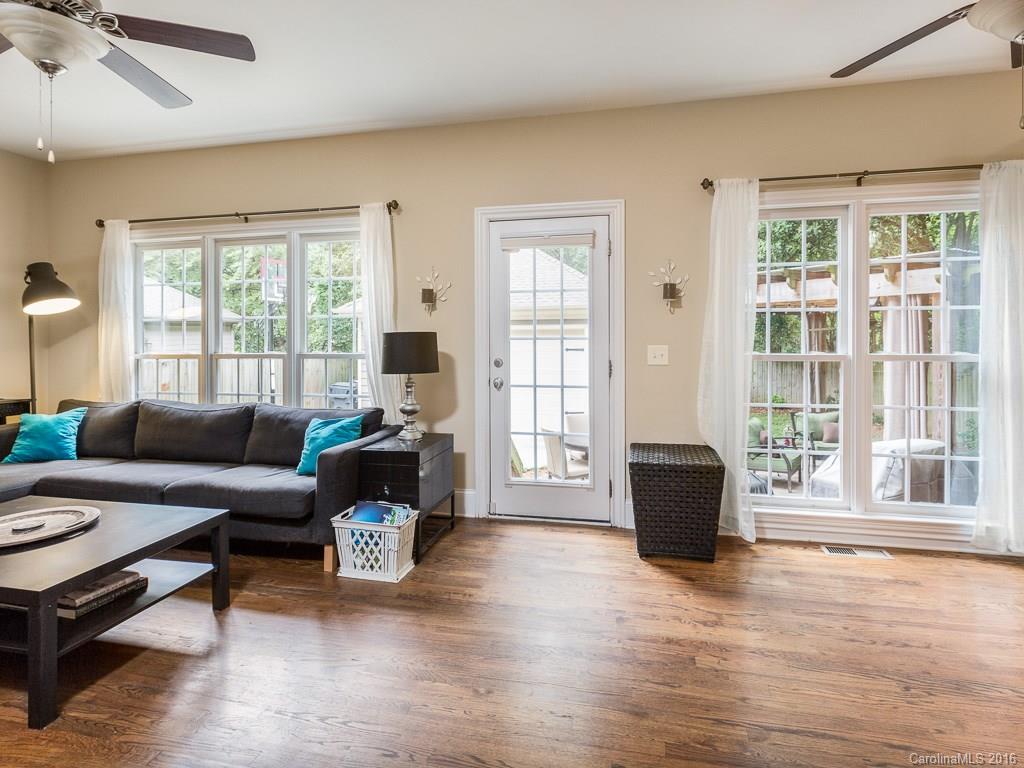 919 Millbrook Road Charlotte, NC 28211 - Photo 7 of 20 a living room with furniture and a large window