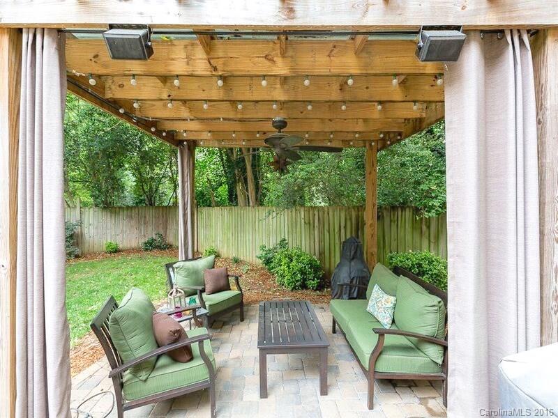 919 Millbrook Road Charlotte, NC 28211 - Photo 9 of 20 a view of yard with outdoor seating and green garden
