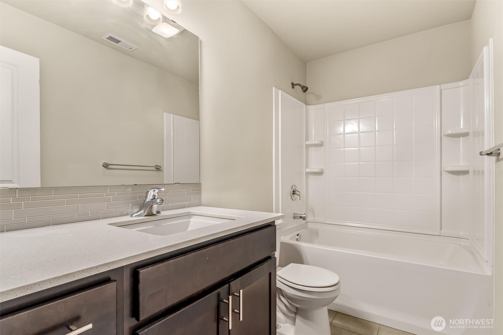 19326 37th Avenue Southeast, Unit C Bothell, WA 98012 - Photo 18 of 32 a bathroom with a sink a toilet and shower