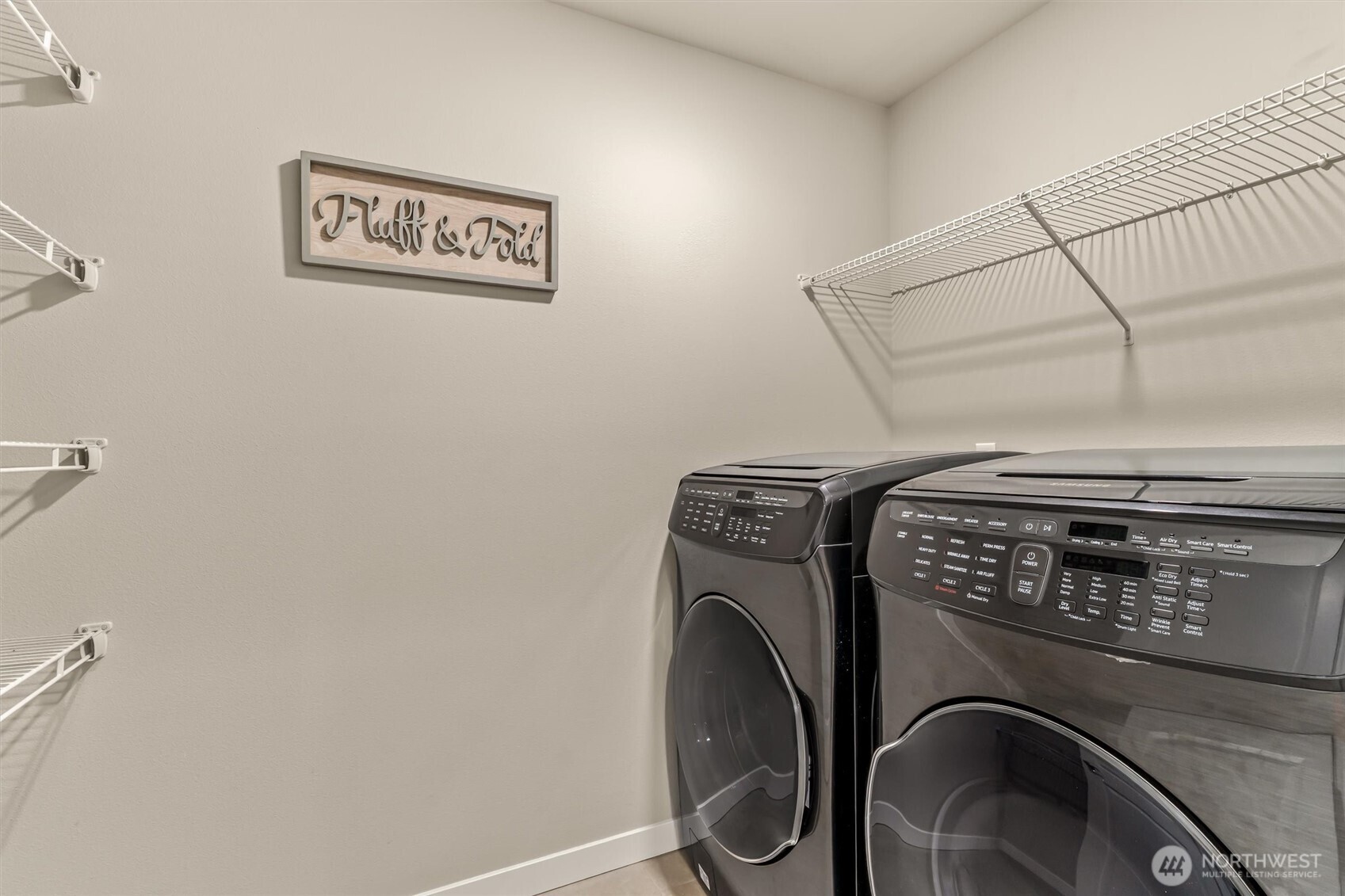 19326 37th Avenue Southeast, Unit C Bothell, WA 98012 - Photo 19 of 32 a close up view of washer and dryer