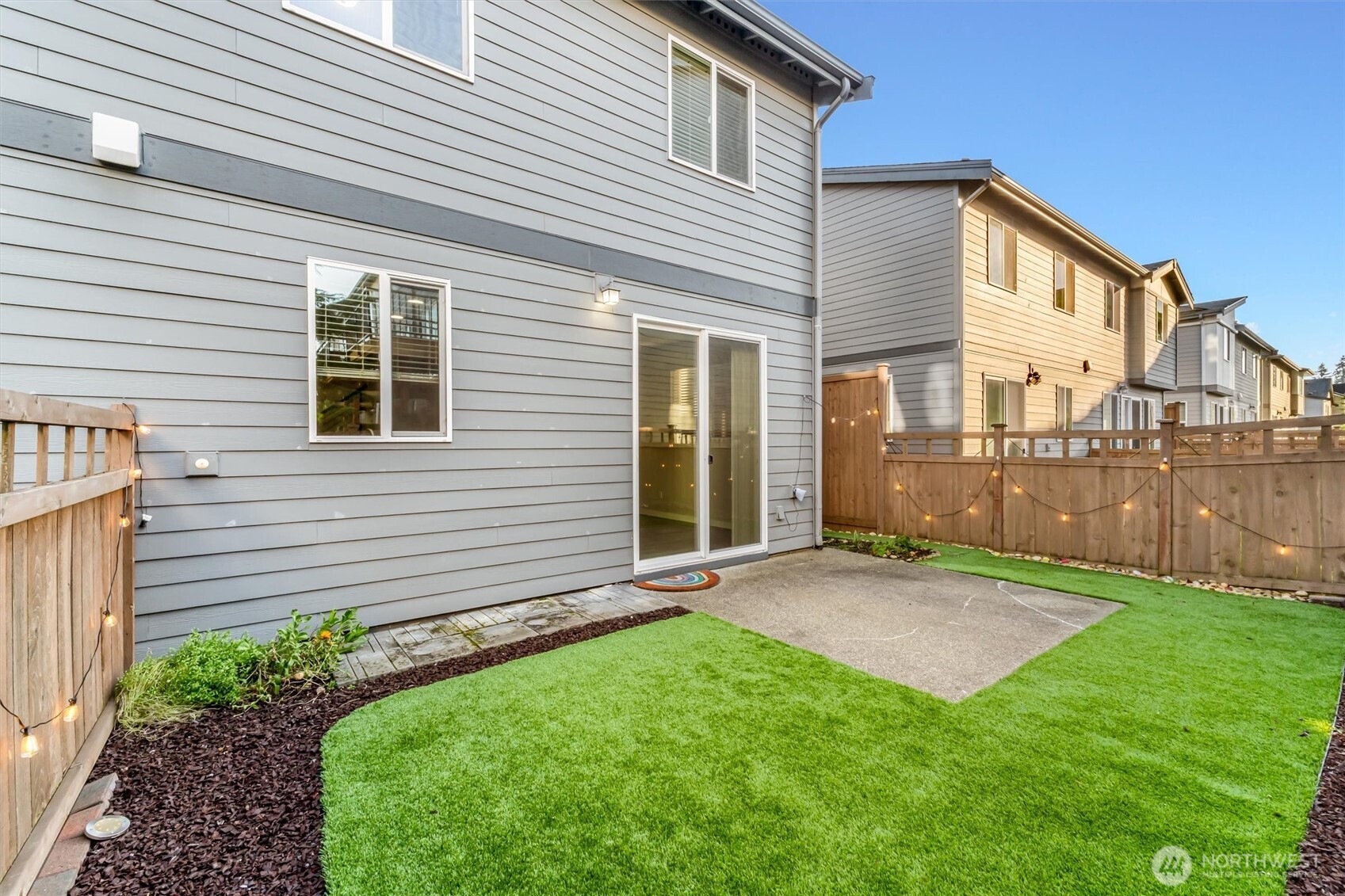 19326 37th Avenue Southeast, Unit C Bothell, WA 98012 - Photo 23 of 32 a view of a house with a yard