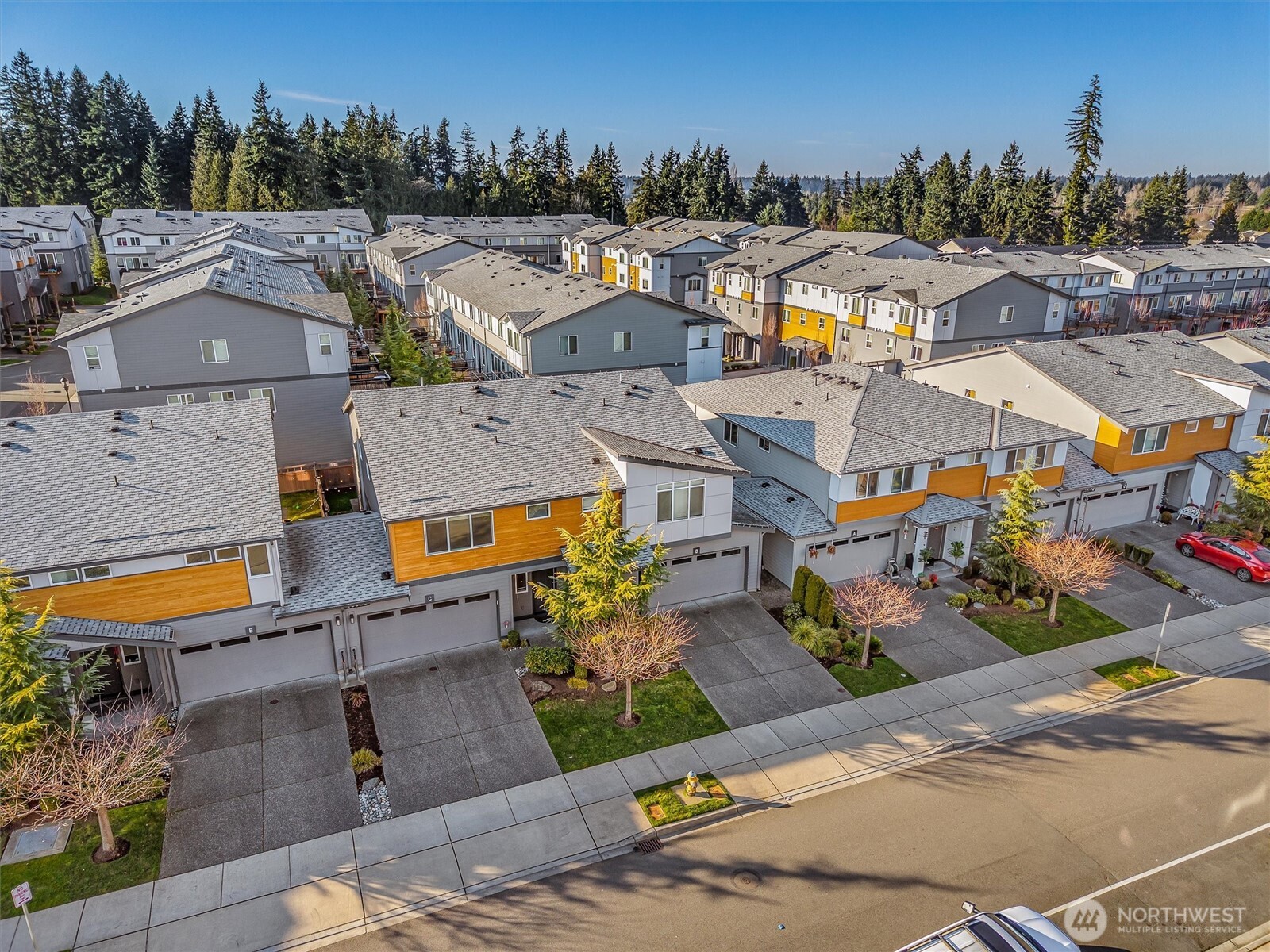 19326 37th Avenue Southeast, Unit C Bothell, WA 98012 - Photo 25 of 32 an aerial view of residential houses with outdoor space