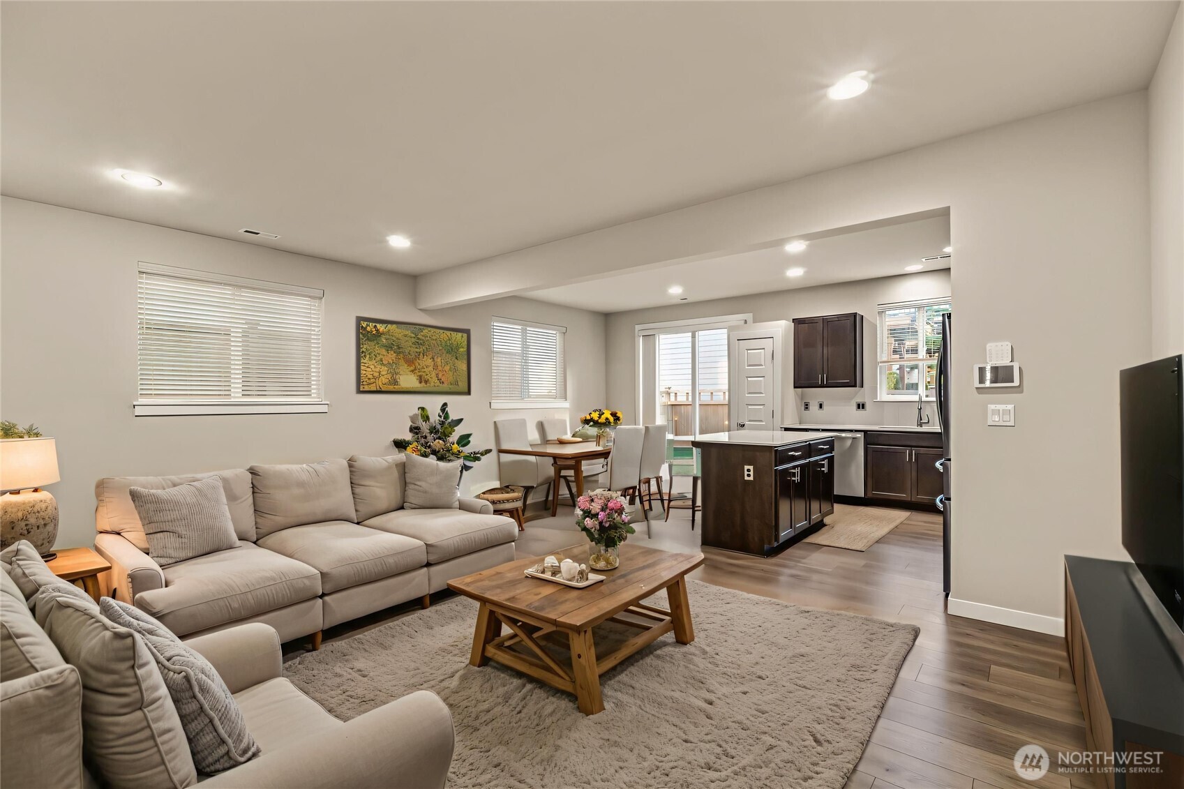 19326 37th Avenue Southeast, Unit C Bothell, WA 98012 - Photo 4 of 32 a living room with furniture kitchen view and a window