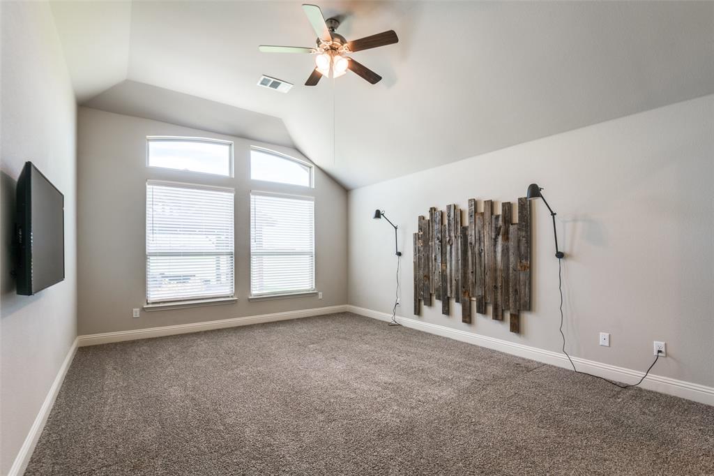 1133 Barrix Drive Forney, TX 75126 - Photo 31 of 35 a view of an empty room with a window