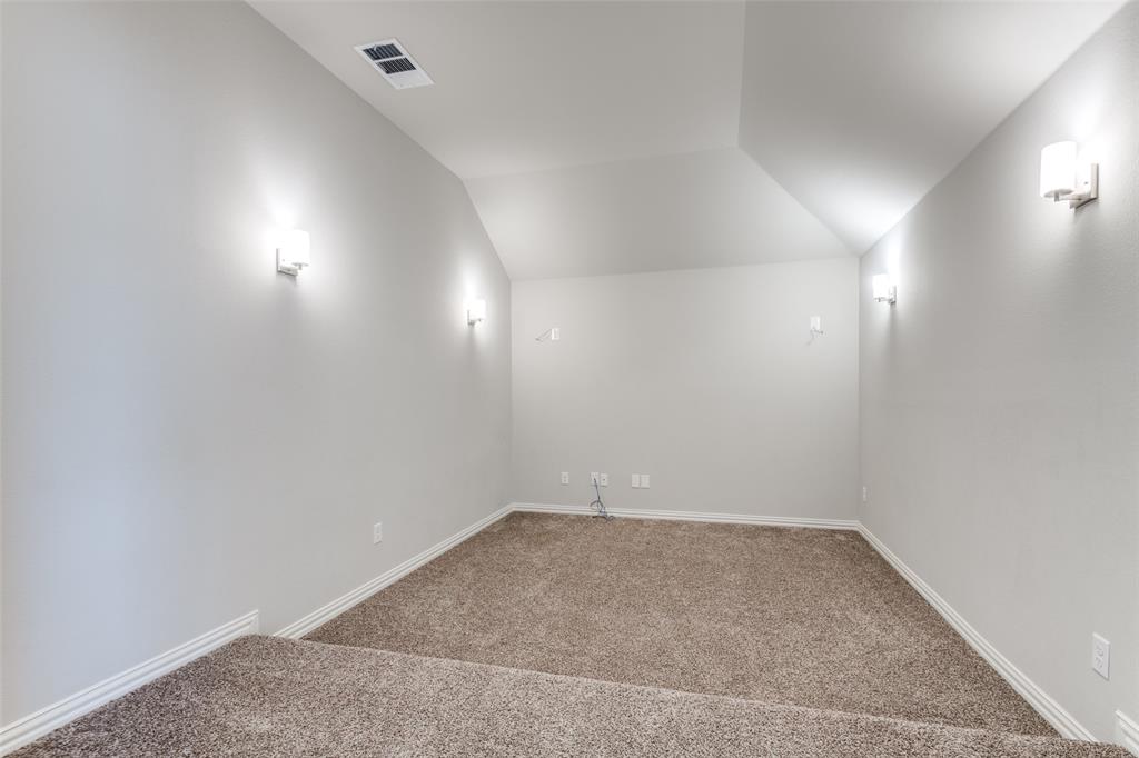 1133 Barrix Drive Forney, TX 75126 - Photo 32 of 35 an empty room with a space