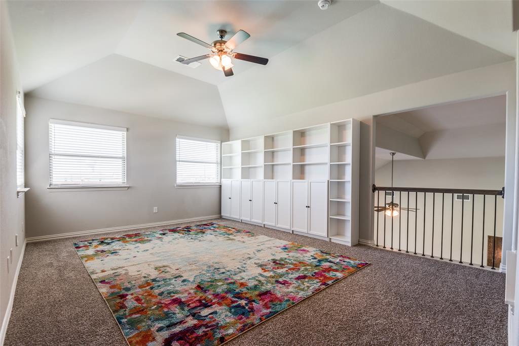1133 Barrix Drive Forney, TX 75126 - Photo 35 of 35 a view of a bedroom with wooden floor