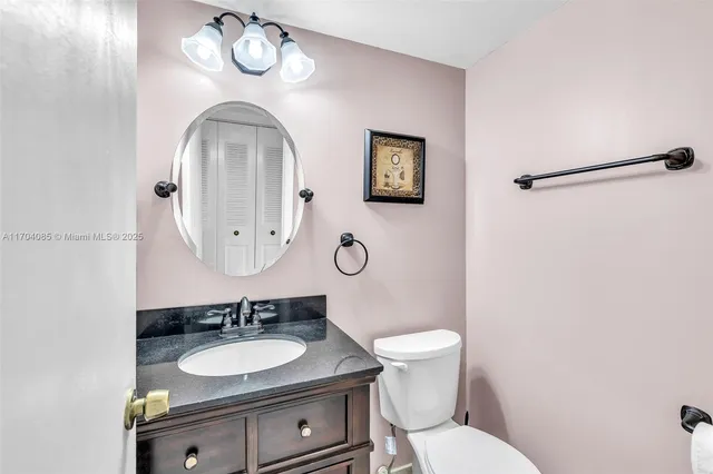 a bed room with a bed and a chandelier