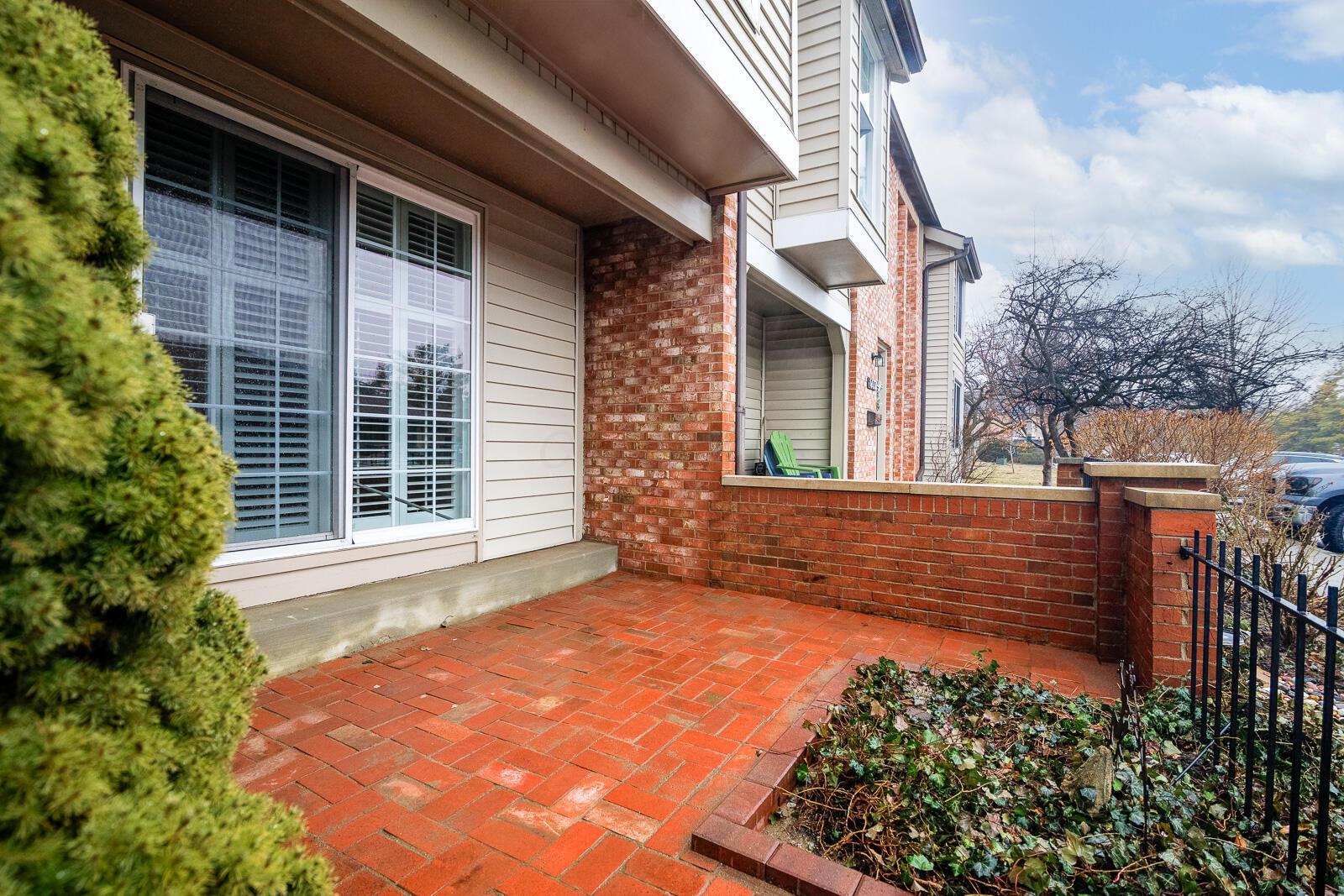 5179 Rittenhouse Square North, Unit 2379 Columbus, OH 43220 - Photo 3 of 32 Wonderful Resurfaced Front Brick Patio with Half Wall,