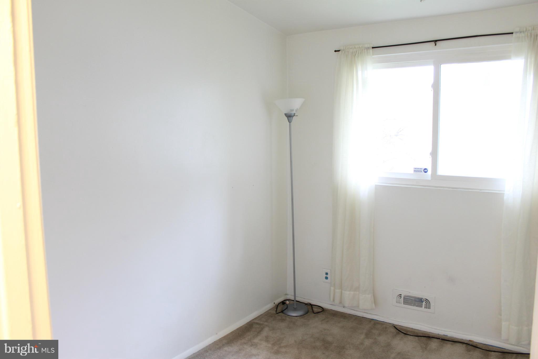 4720 Old Court Road Baltimore, MD 21208 - Photo 17 of 21 Bedroom allows light to come in