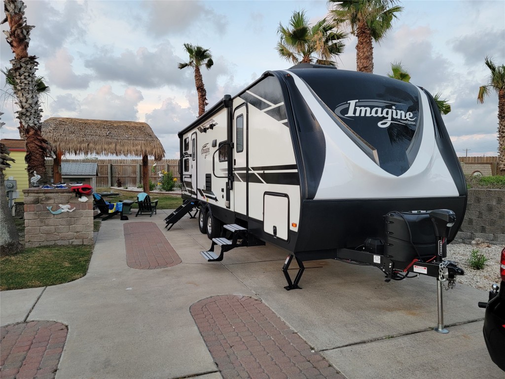 2021 Grand Design Imagine 2800BH - Immaculate Condition - This is not the actual lot but it is the actual camper. This is a lot in Port Aransas, but this camper does include the lot pictured in the other photos