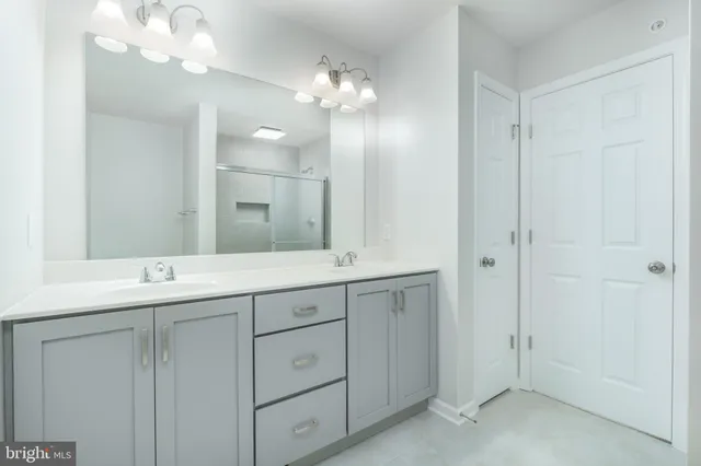 a bathroom with a glass shower